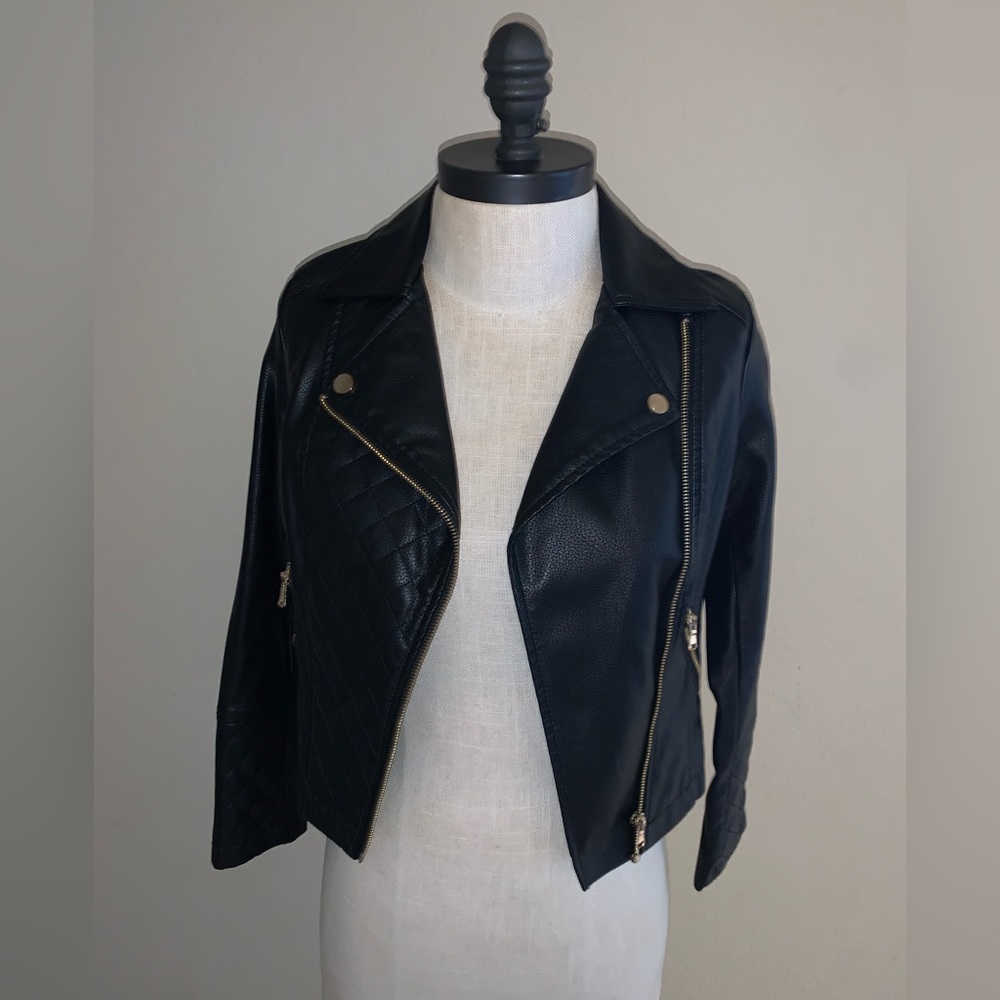 Faux leather jacket with quilted details. M(7/8)